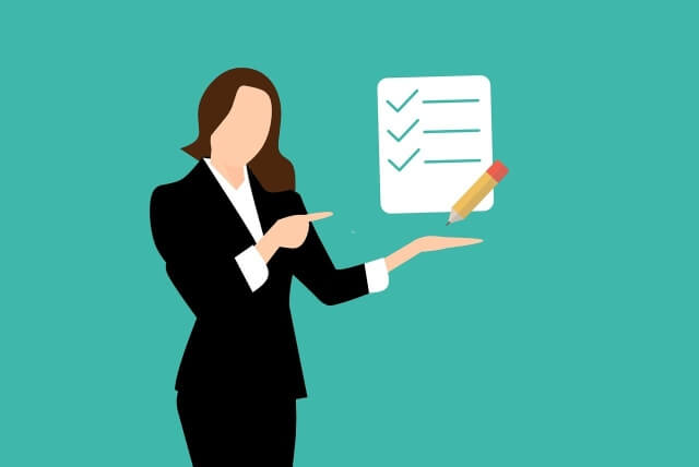 a women pointing to a checklist